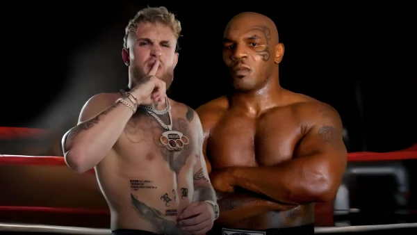 Paul vs Tyson Odds: Image showing Jake paul posing next to mike tyson