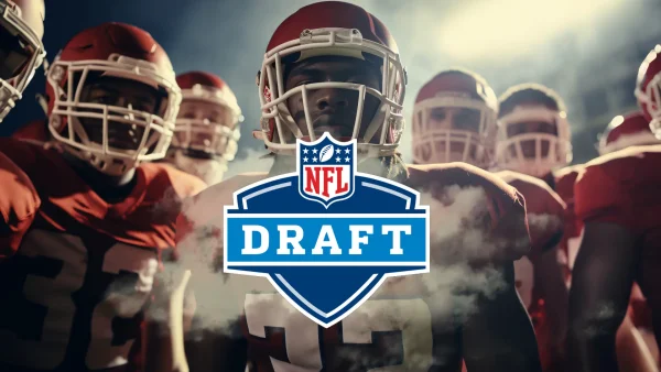 NFL players standing in the backdrop of the NFL Draft smoke effect logo.